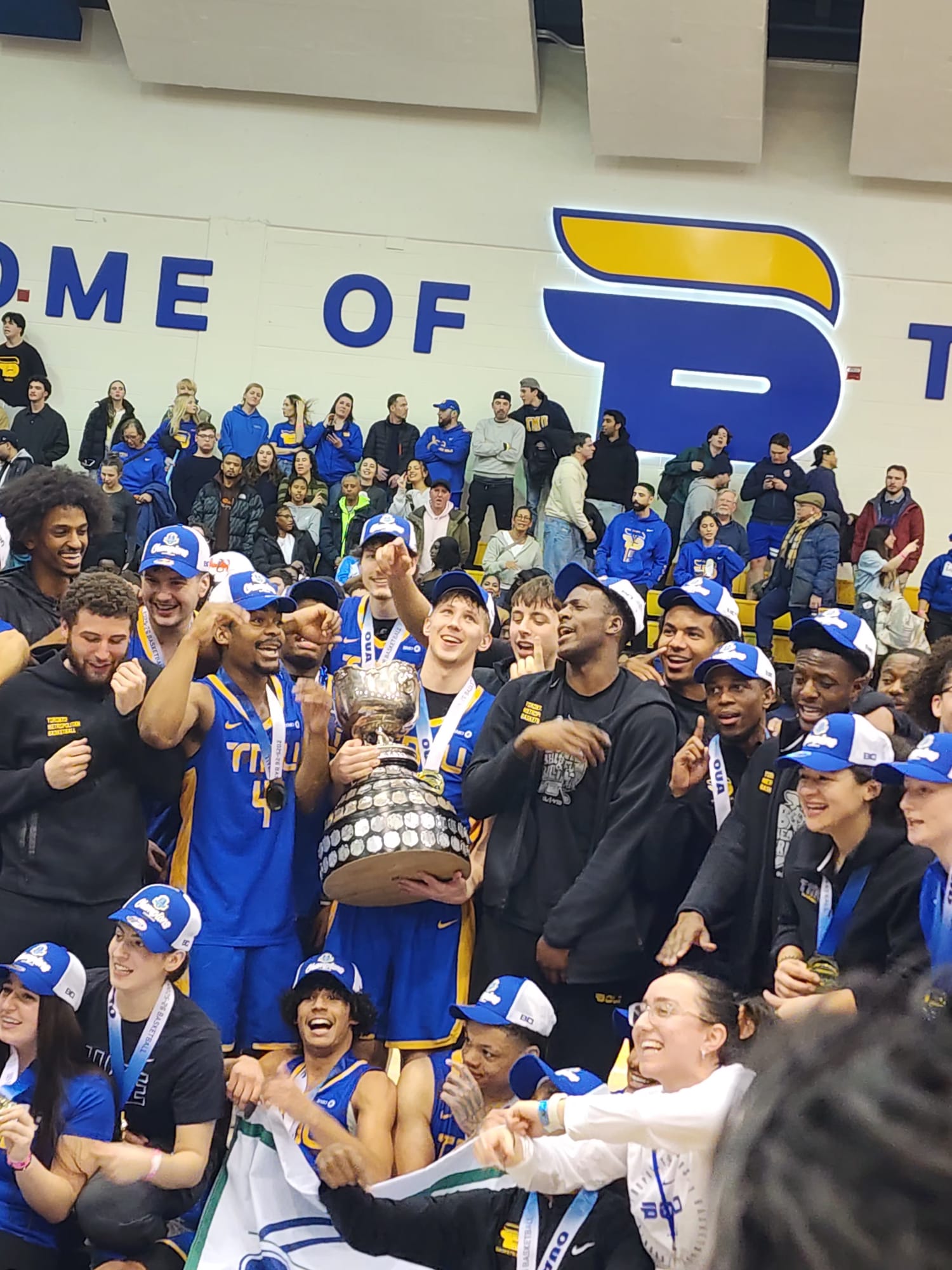 William Academy alumni celebrating TMU championship